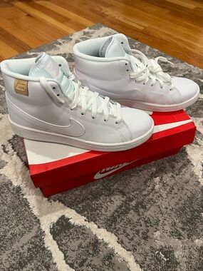 Nike White High-Top Sneakers with Gold Tag